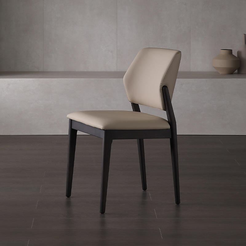 Antique-style dining chair, featuring a high back, vintage PU leather, and a wooden base with a rustic finish, ideal for family living rooms and dining rooms